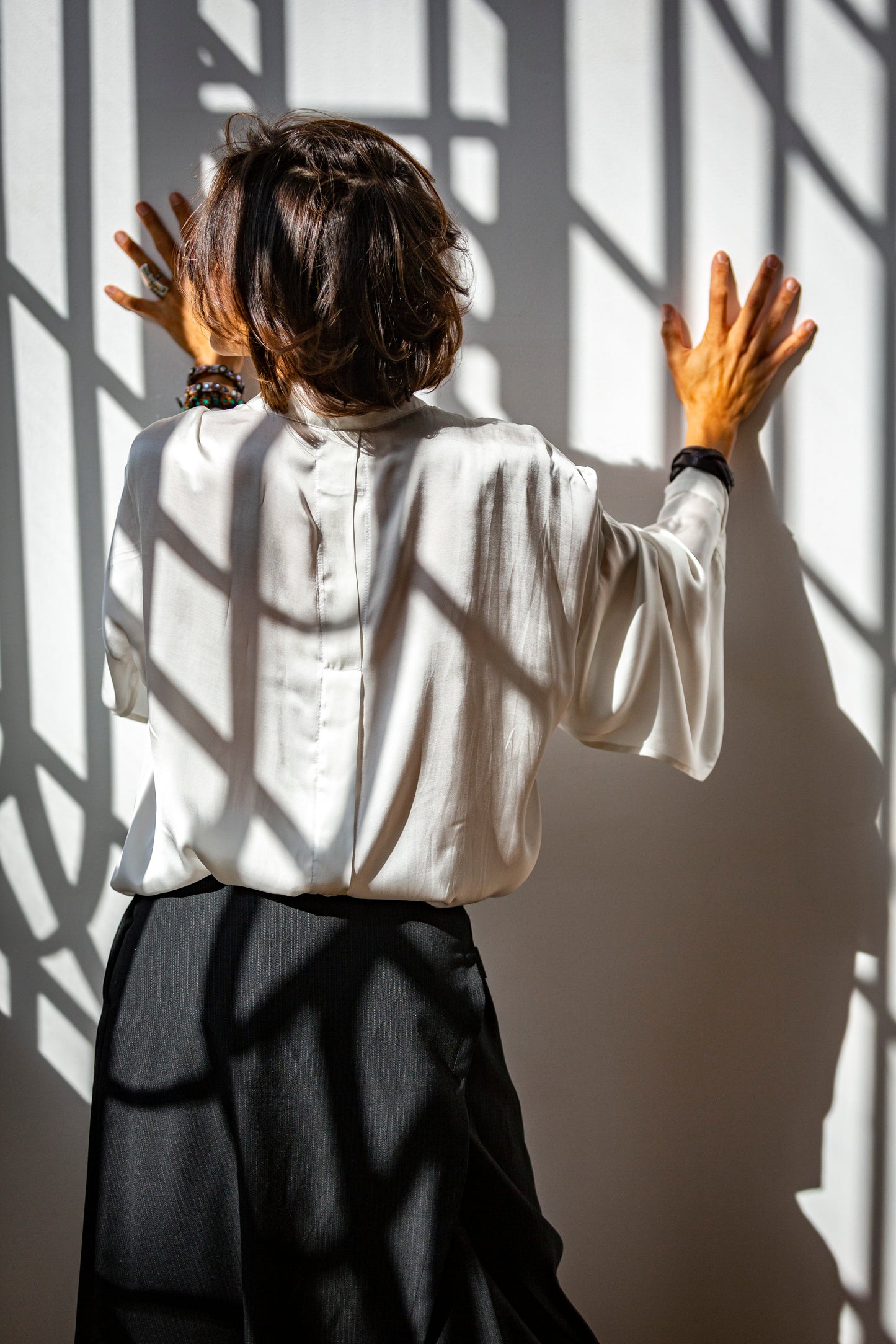 Shirt with long sleeves made of natural white viscose. We make it according to individual sizes.