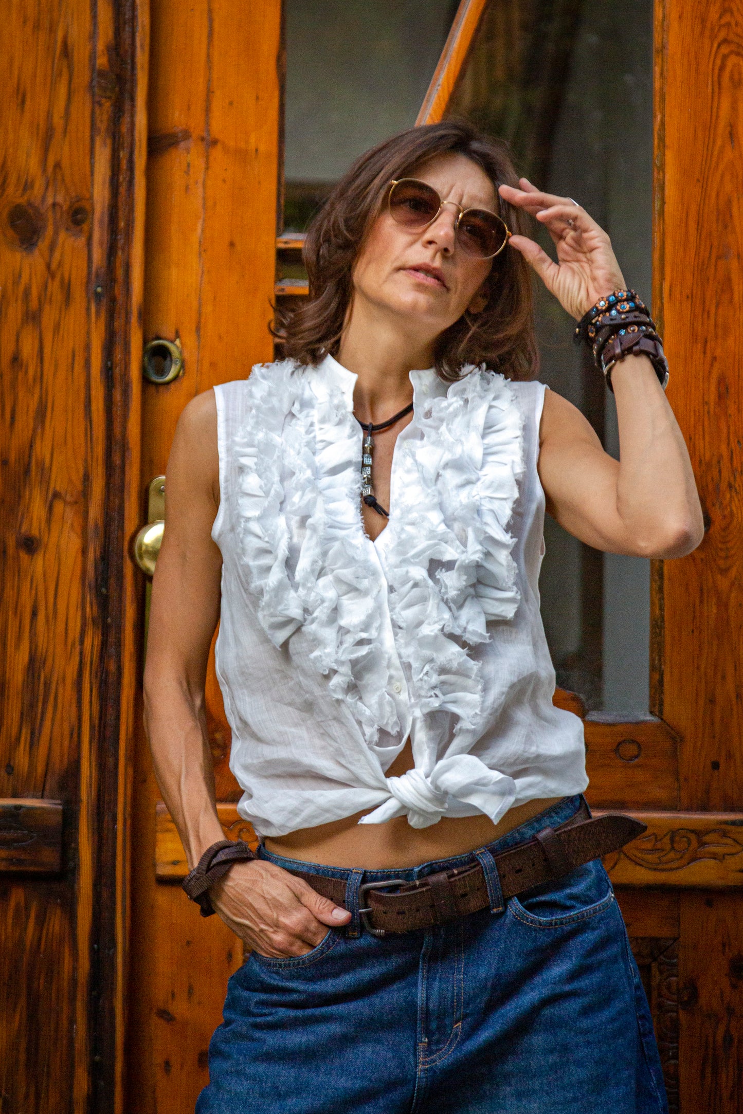 White sleeveless linen shirt. We make it according to individual sizes.